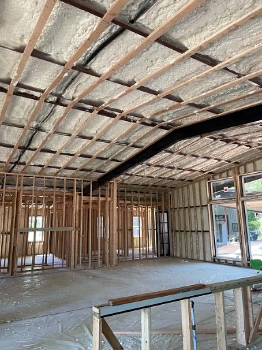 Open-cell spray foam in the ceiling of a new home build