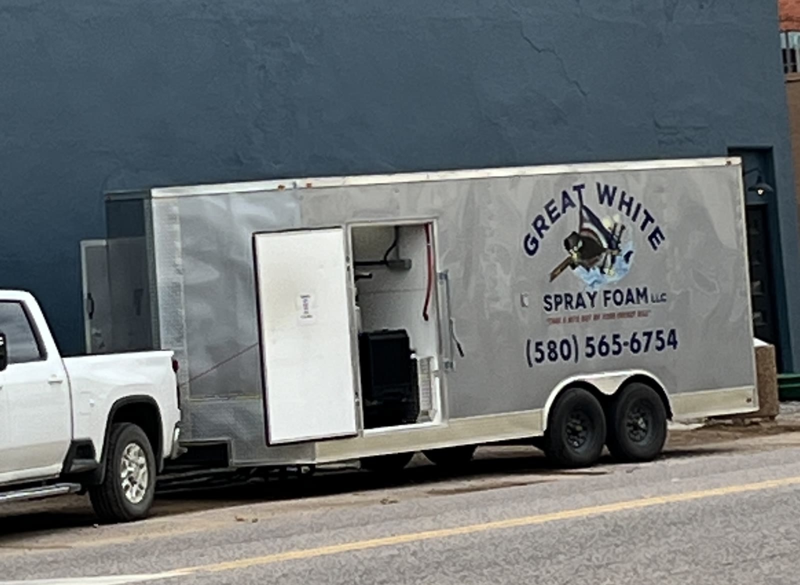 Great White Spray Foam trailer with shark logo, ready to work